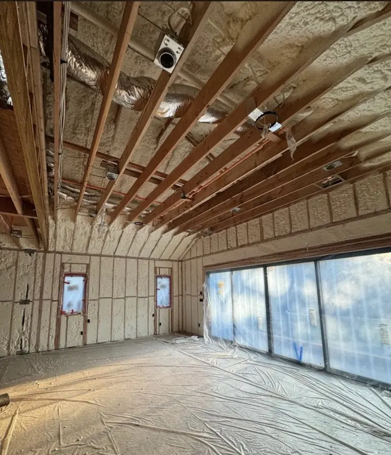 Interior walls and ceiling insulated with spray foam during new construction in Westminster